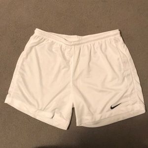 white nike women’s soccer shorts